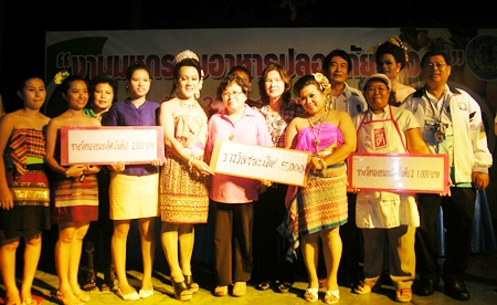 The winners and dancers pose for the press.